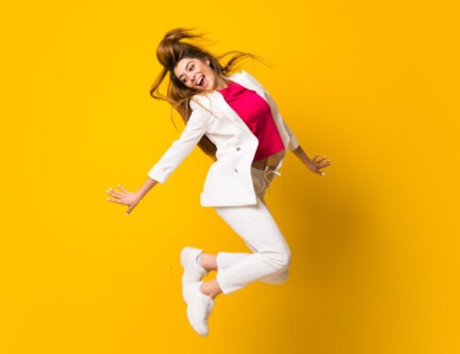 excited woman jumping for joy